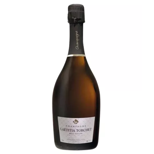 Bottle of LAËTITIA TORCHET Brut Nature champagne.