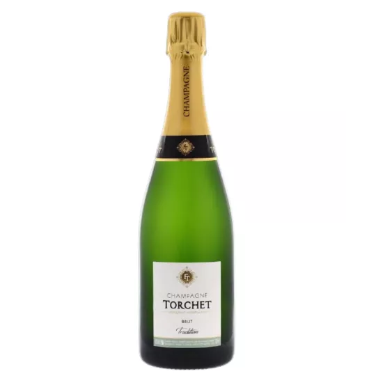 シャンパーニュ LAËTITIA TORCHET Brut Traditionのボトルをサービス。